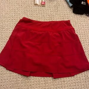 Red tennis skirt